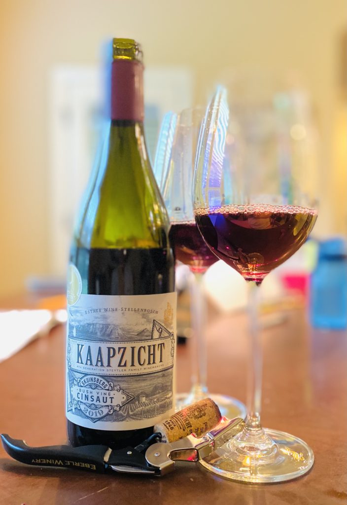 Kaapzicht bottle with wine in glasses